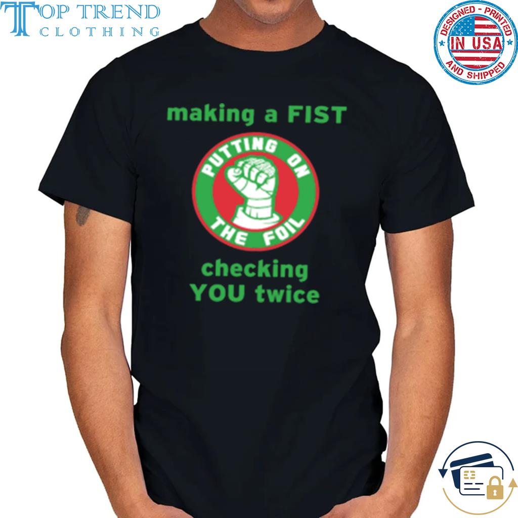 Making a fist putting on the foil shirt